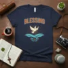 Navy t-shirt with the word BLESSING in orange and white, and a white dove in flight above blue waves and