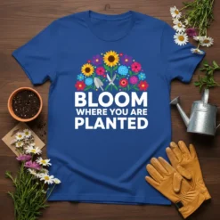 Bloom Where You Are Planted quote t-shirt with colorful floral graphic and gardening tools