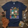Bloom Where You're Planted t-shirt with gnome, sunflowers, and mushrooms graphic