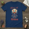 Bloom with Grace text with a lotus flower graphic on a navy blue t-shirt