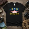 Black t-shirt with "Blowing Rock NC" text and North Carolina map graphic featuring mountains