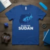 Blue For Sudan t-shirt with map graphic, raised hands, and dove, symbolizing solidarity and support