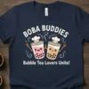 Boba Buddies Bubble Tea Lovers Unite! text with two cute boba cups graphic on a navy blue t-shirt