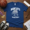 Blue t-shirt with "BOBCATS BASKETBALL" text and a fierce bobcat mascot holding a basketball