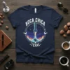 Navy t-shirt graphic featuring a rocket launching into space, text reads "Boca Chica Texas Rocket Launch"