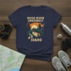 Boise River Greenbelt Idaho t-shirt design featuring a cyclist, kayakers, city skyline, and mountains at sunset