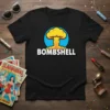 Black t-shirt with a white text "BOMBSHELL" below a yellow mushroom cloud explosion graphic in a blue circle