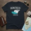 Bonifacio Corsica t-shirt design featuring white text over a graphic of white cliffs with buildings and blue water with a