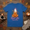 Boo Jee Basic Witch t-shirt design with a cute ghost wearing a witch hat and holding coffee, stacked on pumpkins