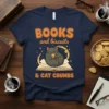 BOOKS and biscuits & CAT CRUMBS t-shirt design with a black cat sitting on a book eating a biscuit, surrounded