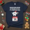 T-shirt with text "Boom Boom Boom Let Me Hear You Say It's Christmas 2020" and a cartoon tooth wearing a