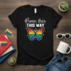 Black t-shirt with "Born this WAY" text and a colorful rainbow butterfly graphic, celebrating LGBTQ+ pride