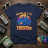 Born in the 1990s text with retro rocket and cityscape graphic on a navy blue t-shirt