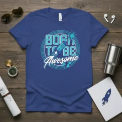 Born to Be Awesome text with a rocket launching through a circular graphic on a blue t-shirt