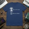 Navy blue t-shirt featuring "Born to be root" above a tree graphic and "Born to reboot" above a computer window