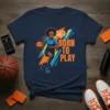 Born To Play basketball graphic t-shirt with a female player dribbling and heart rate line