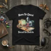 Black t-shirt with "Born To Quest Forced To Clock In" text and knight at computer graphic