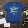 Blue t-shirt with white text "Boyfriend Bestie Fiance" and a diamond ring graphic