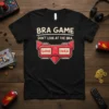 Black t-shirt with "BRA GAME DON'T LOOK AT THE BRA. GAME OVER" text and red retro VR headset graphic