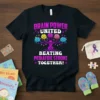 Brain Power United Beating Pediatric Stroke Together t-shirt with colorful brains on a tree and purple awareness ribbon