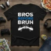 Bros Before Bruh text design with fist bump graphic on a black t-shirt