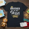 Brother of the Sassy One text with a crown and sparkles on a black t-shirt
