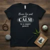 Black t-shirt featuring the quote "Bruce Lee said CALM is a super power" in white and grey text