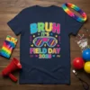 BRUH IT'S FIELD DAY 2025 text with colorful retro sunglasses graphic on a navy blue t-shirt