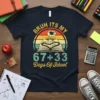 Bruh Its My 67+33 Days Of School T-Shirt with vintage sunset, open book, school bus, and graduation cap graphic