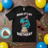 Bruh It's My Birthday T-Rex dinosaur graphic with birthday cake and party hat