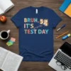 Bruh, It's Test Day you got this! text with graduation owls graphic on a navy blue t-shirt
