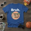Bruh. t-shirt design with a cartoon sloth hanging from a branch, white text on blue shirt