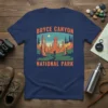 Bryce Canyon National Park graphic t-shirt with hiking scene and text, featuring hoodoos and pine trees