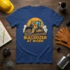 Bulldozer At Work T-Shirt design featuring a yellow bulldozer moving dirt with a sunset background
