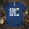Bullshit Weary Crazy Old Lady text design with a red rose and small "Youv'eBen Waned" signature on a navy t-shirt