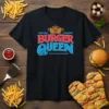 Black t-shirt with "Burger Queen" text in red and blue, topped with a golden crown graphic