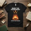Black t-shirt with white text "Burn The Patriarchy Ignite The Change" and a graphic of a woman holding torches above