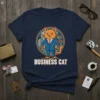 Business Cat T-Shirt with a cartoon cat wearing a suit and tie, standing in front of a circular cityscape graphic