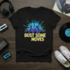 Bust Some Moves text with silhouetted dancers and city skyline graphic on a black t-shirt