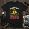 Black t-shirt with "But Officer The Sign Said Do A Burnout" text, featuring a yellow warning sign with a car