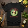 Black t-shirt featuring a "Butcher Diagram AVOCADO" graphic with sections for Salad, Guacamole, and Raw uses