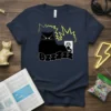 BZZZZ Cat Plugging In T-Shirt featuring a black cat near an electrical outlet with yellow lightning bolts and "BZZZZ" text
