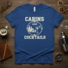 CABINS and COCKTAILS text with cabin and cocktail graphic on blue t-shirt