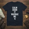 Calm Doon It Wasnae Me Scottish phrase t-shirt with a white lion graphic
