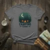 Camping Crew t-shirt design with tents, campfire, moon, and pine trees in a circular emblem