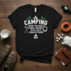 Black t-shirt with white text: "CAMPING WHERE YOU SPEND A SMALL FORTUNE TO LIVE LIKE A HOMELESS PERSON", surrounded by