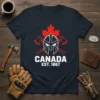 CANADA EST. 1867 t-shirt design with a red maple leaf, warrior helmet, and crossed axes in white and red