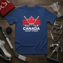 Navy blue t-shirt featuring red and white "CANADA HOCKEY POWER" text with a red maple leaf and hockey sticks graphic