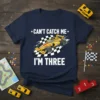 Can't Catch Me I'm Three race car birthday t-shirt with yellow race car on checkered flag background