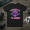Black t-shirt with "CAN'T HEAR YA I'M GAMING" text and a futuristic robot head graphic wearing headphones